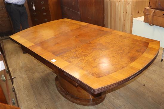 An Art Deco birds eye maple extending dining table 138cm